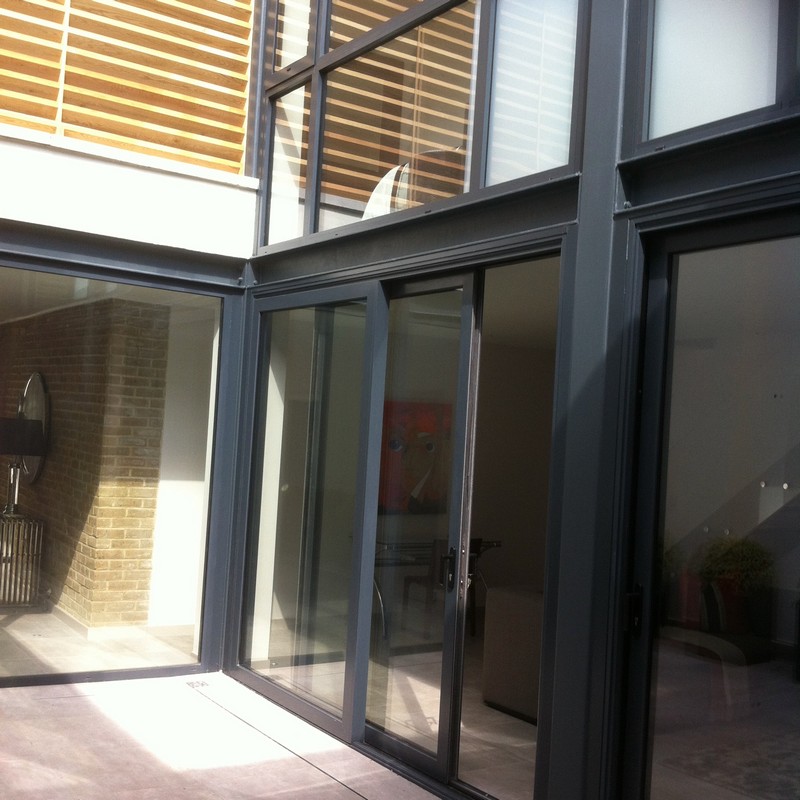 Anthracite aluminium sliding patio doors fitted in Gerrards Cross